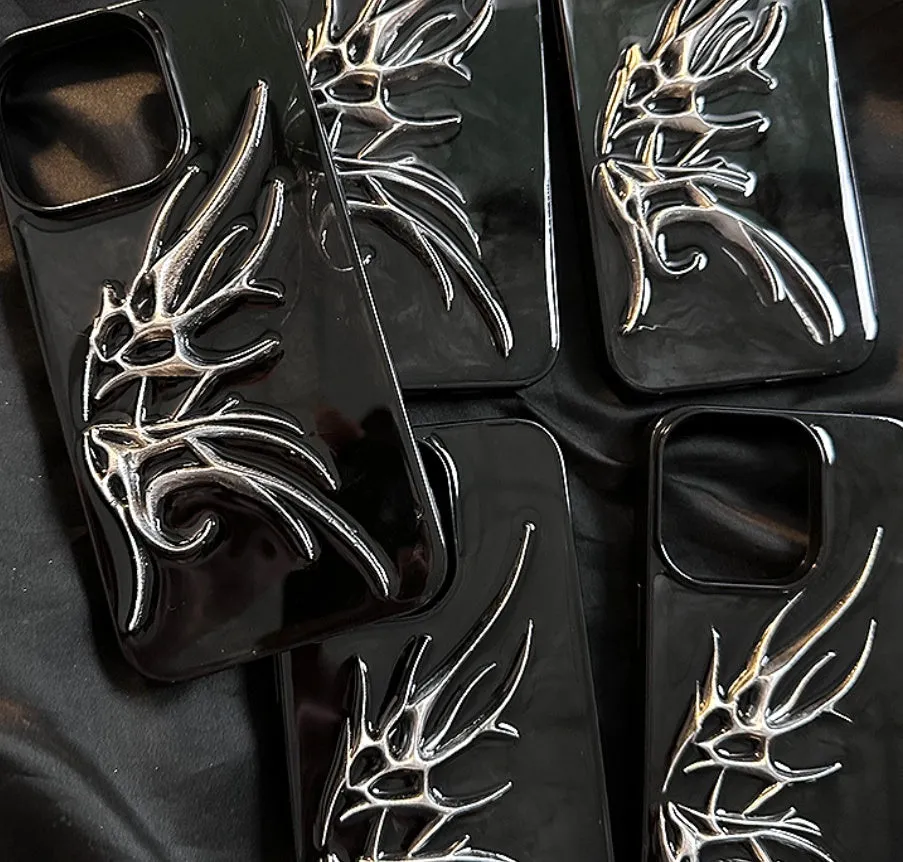 Black iPhone case with three-dimensional blurred wings design showing raised edges and precise port cutouts