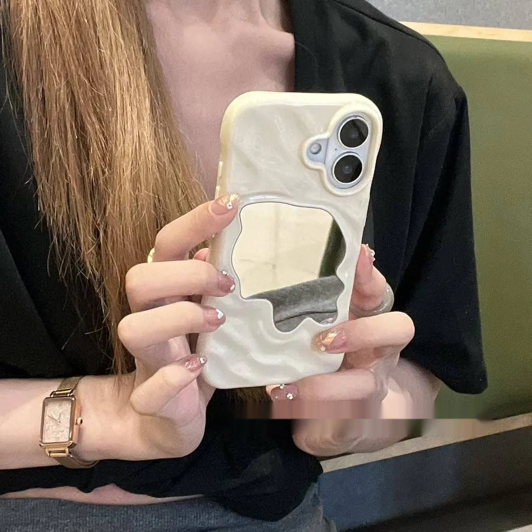 Beige iPhone case with a water ripple texture and a mirrored strip on the back.