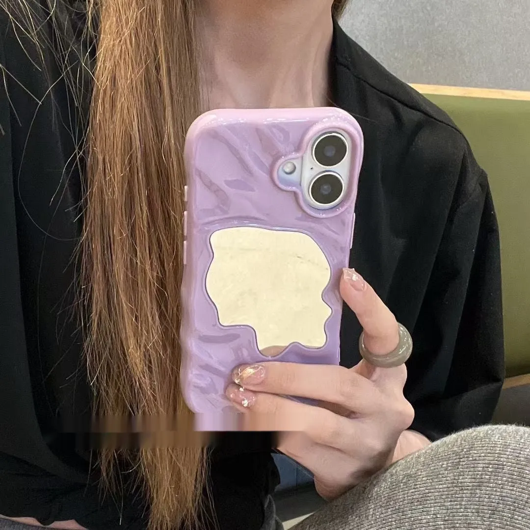 Beige iPhone case with a water ripple texture and a mirrored strip on the back.