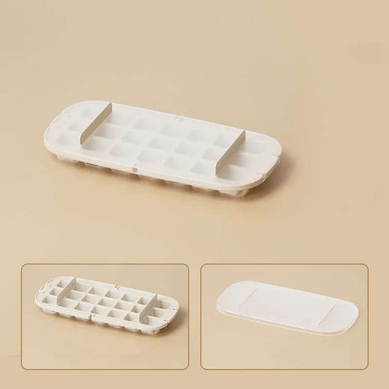 Blue high-capacity ice cube tray with grid design and a built-in storage slot for an ice shovel.