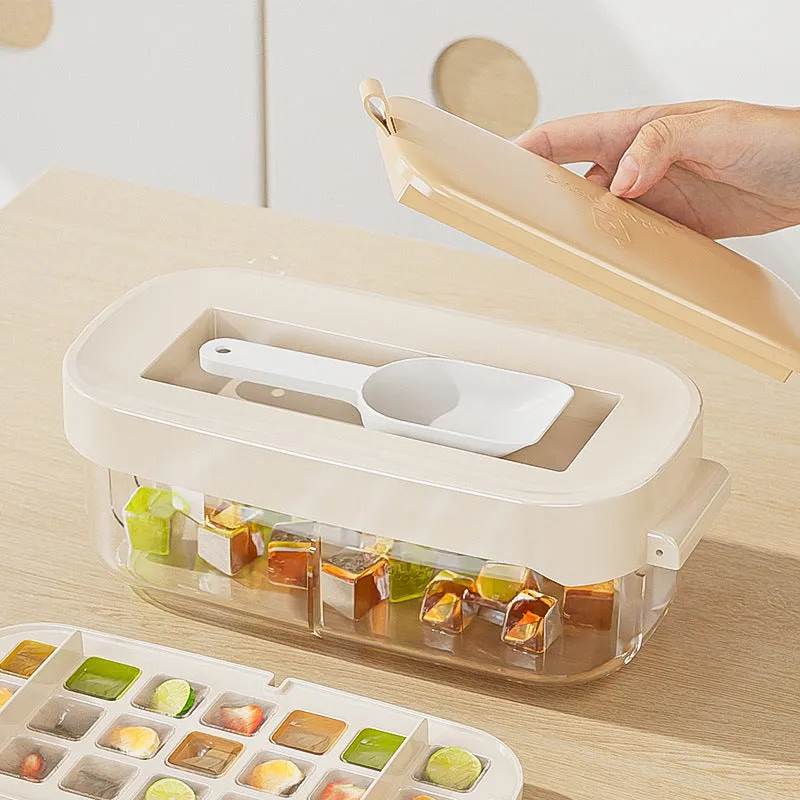 Blue high-capacity ice cube tray with grid design and a built-in storage slot for an ice shovel.