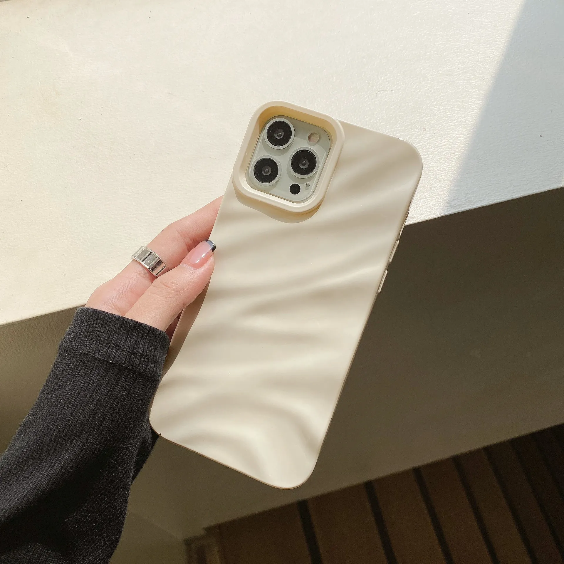 Wave pleated TPU phone case for Apple iPhone 17 in burgundy colour showing textured pattern