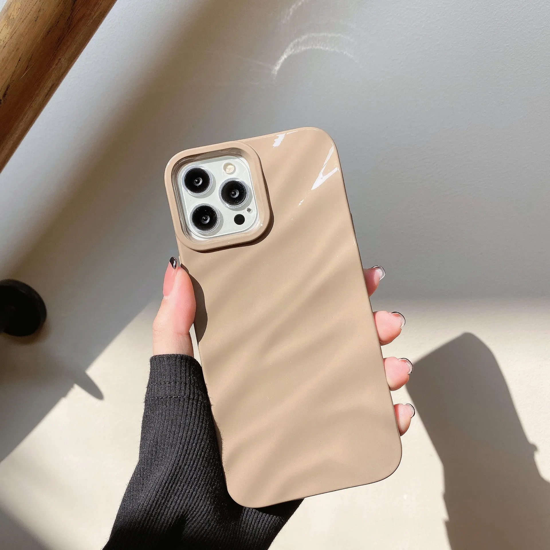 Wave pleated TPU phone case for Apple iPhone 17 in burgundy colour showing textured pattern