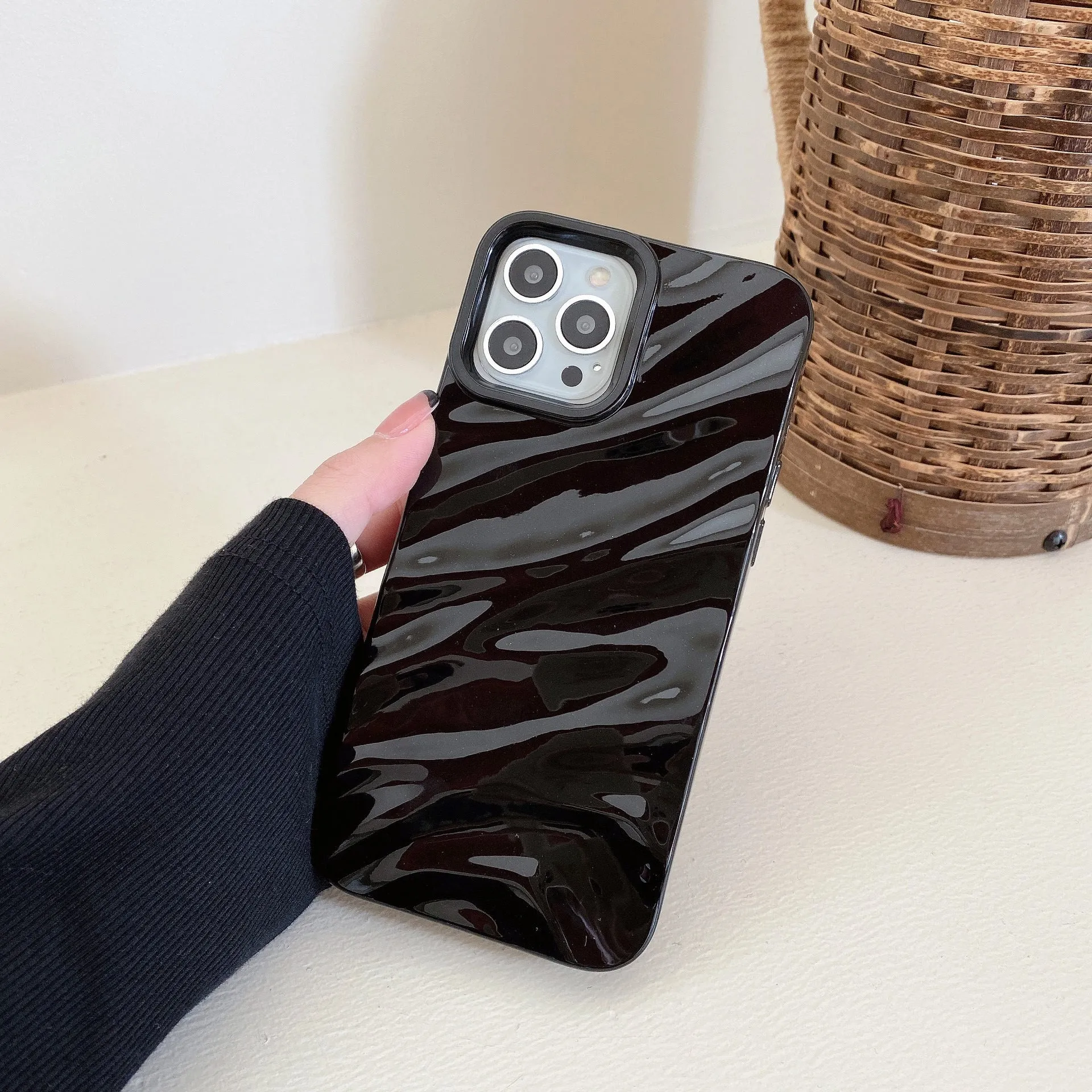 Wave pleated TPU phone case for Apple iPhone 17 in burgundy colour showing textured pattern