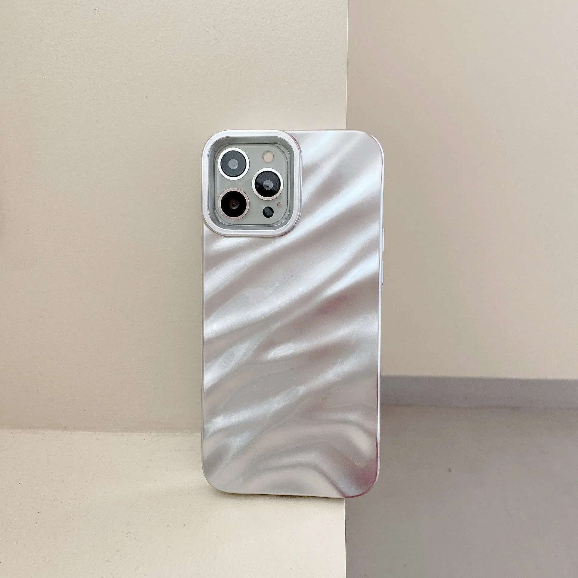 Wave pleated TPU phone case for Apple iPhone 17 in burgundy colour showing textured pattern