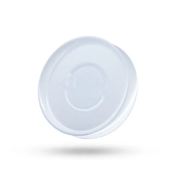 Transparent reusable nano gel adhesive pads in circular and square shapes on a smooth surface