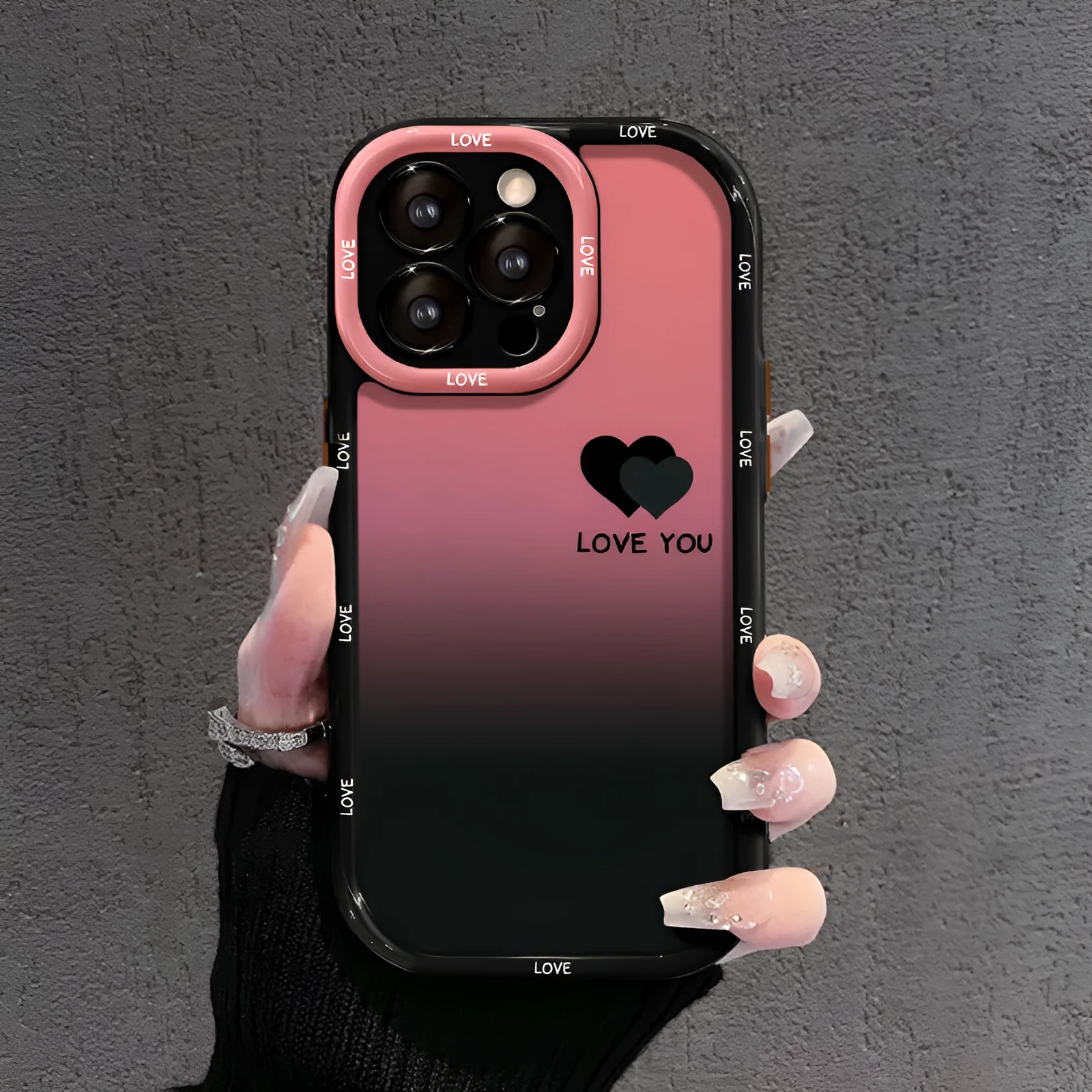 Cream and black acrylic phone case with fine hole design for Huawei and iPhone, showing gradient love heart pattern.