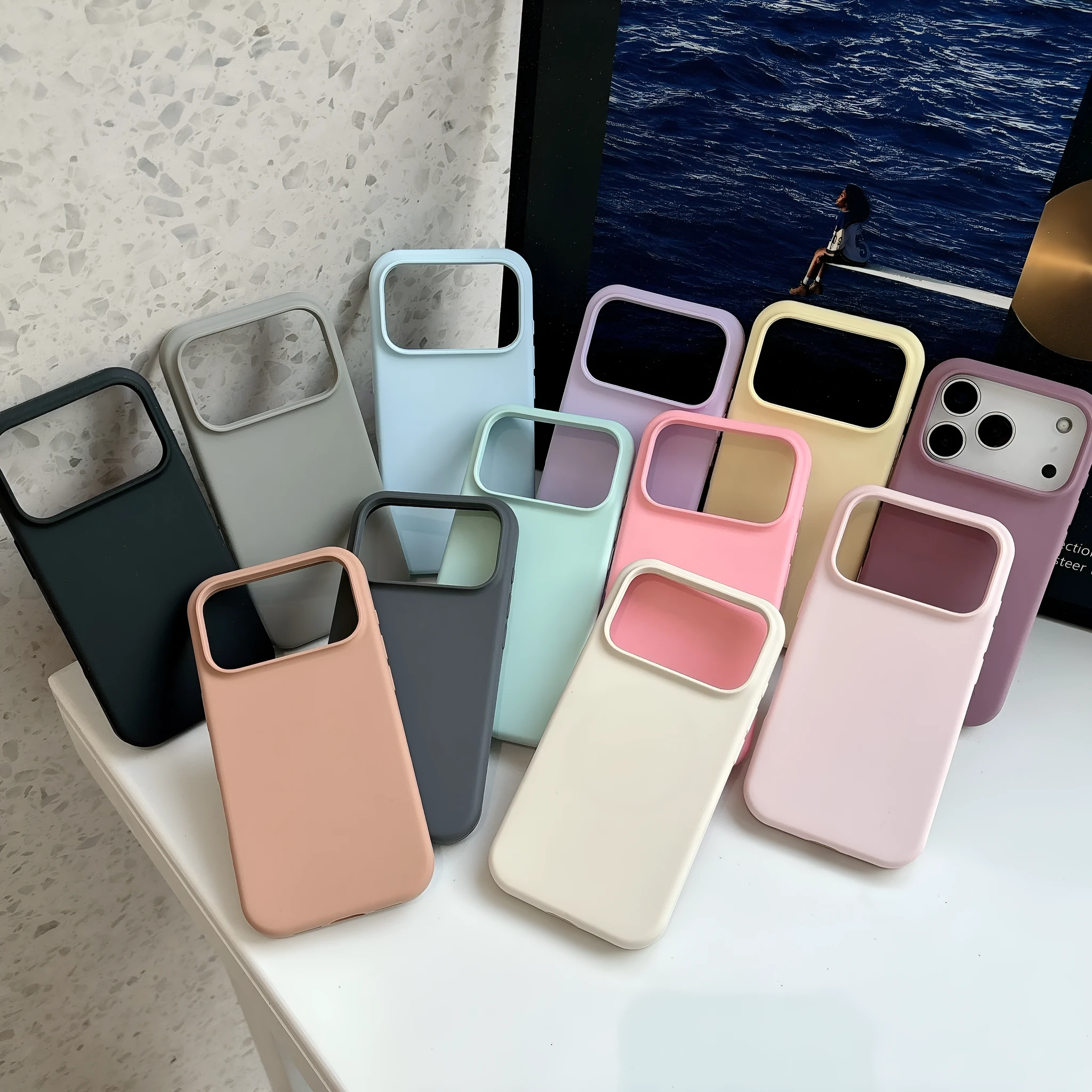 Magnetic liquid silicone phone case for iPhone showing multiple colour options including antique white and desert colour.