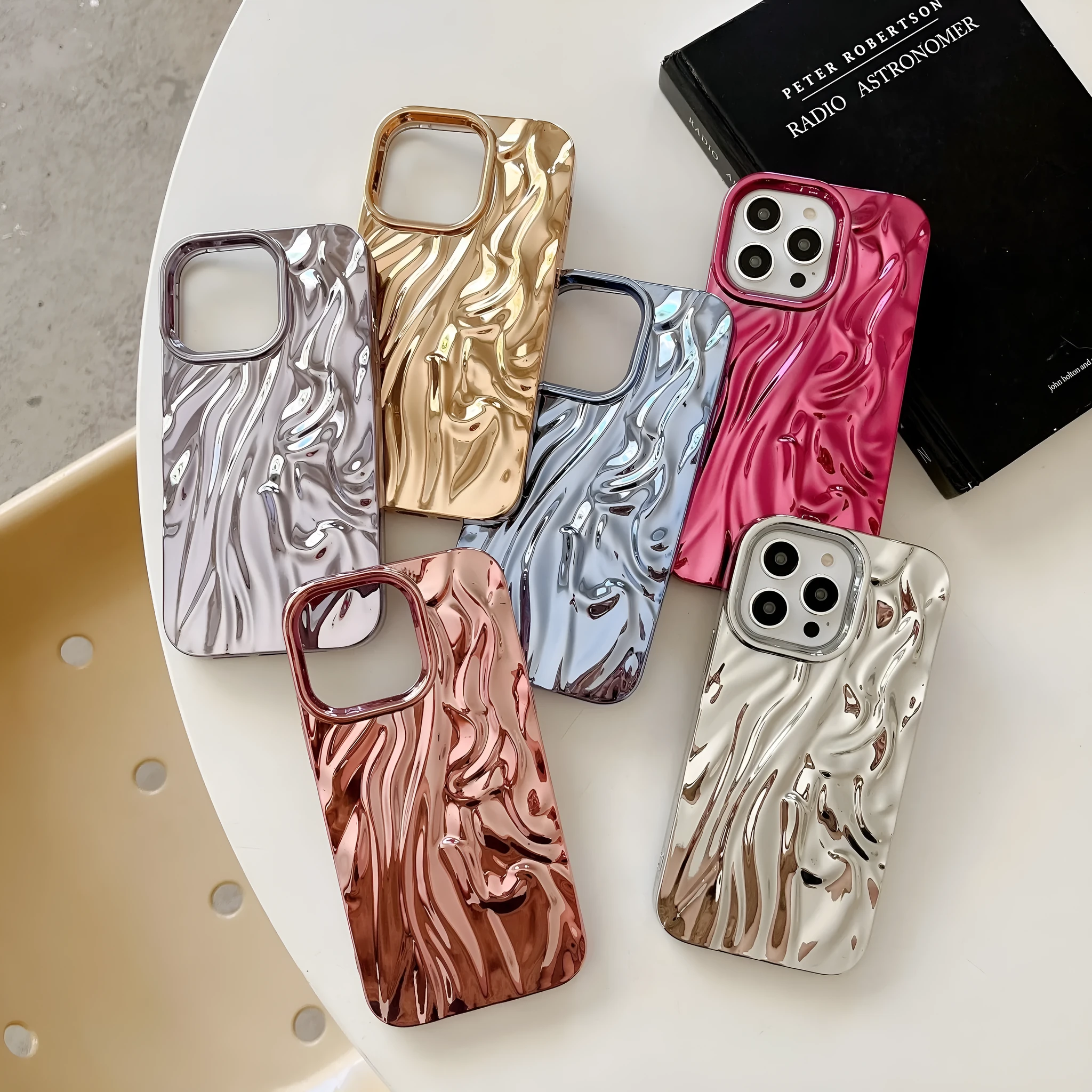 Soft TPU iPhone case with a textured pleated pattern in a rose red electroplated colour.