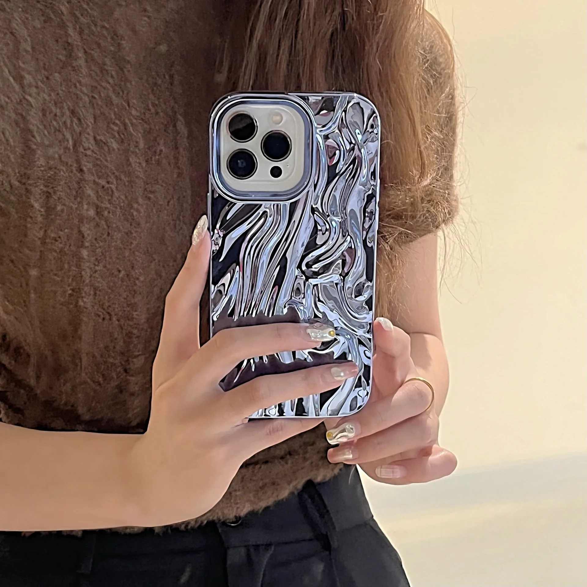 Soft TPU iPhone case with a textured pleated pattern in a rose red electroplated colour.