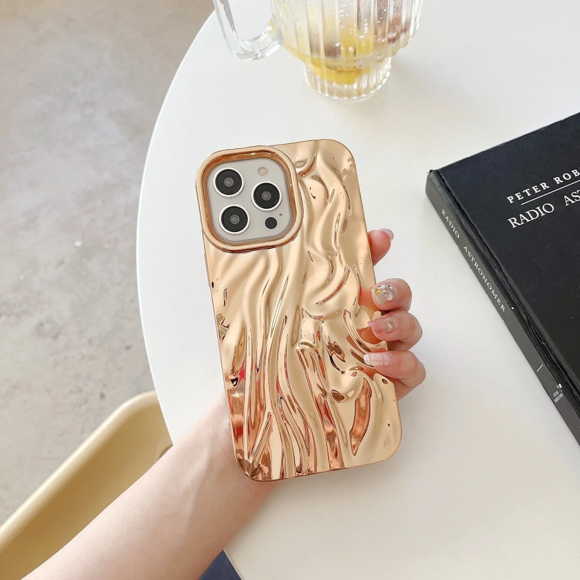 Soft TPU iPhone case with a textured pleated pattern in a rose red electroplated colour.