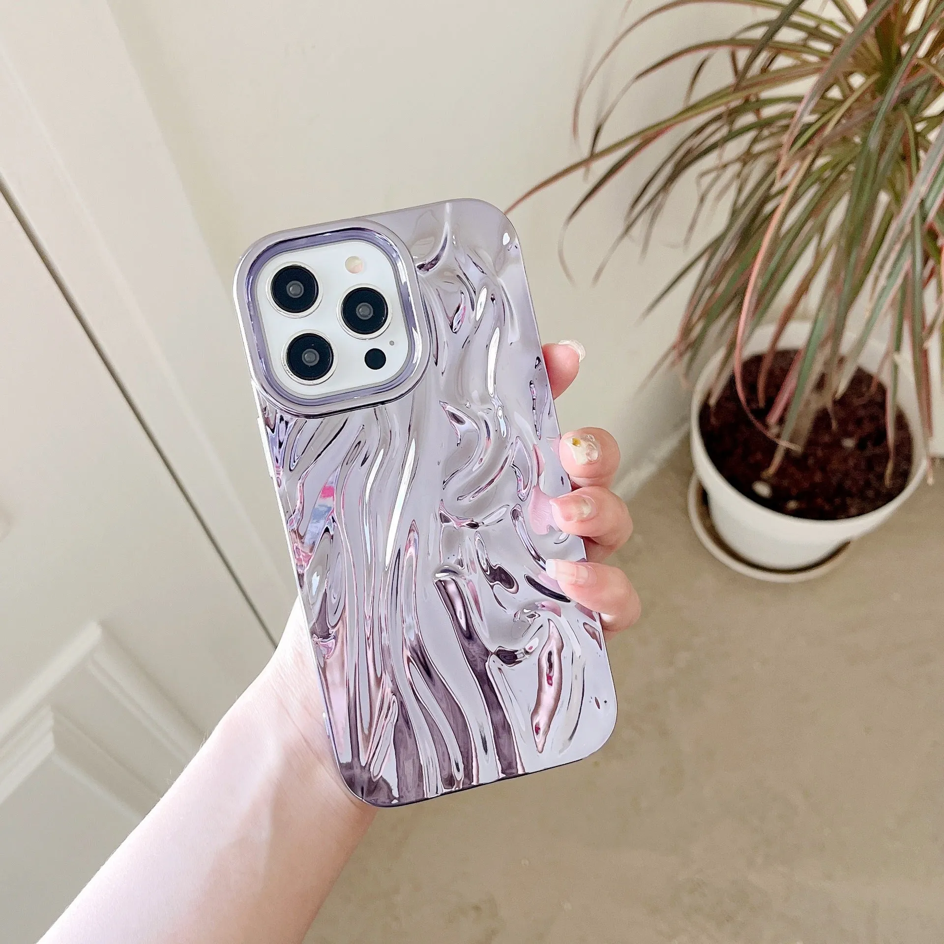 Soft TPU iPhone case with a textured pleated pattern in a rose red electroplated colour.