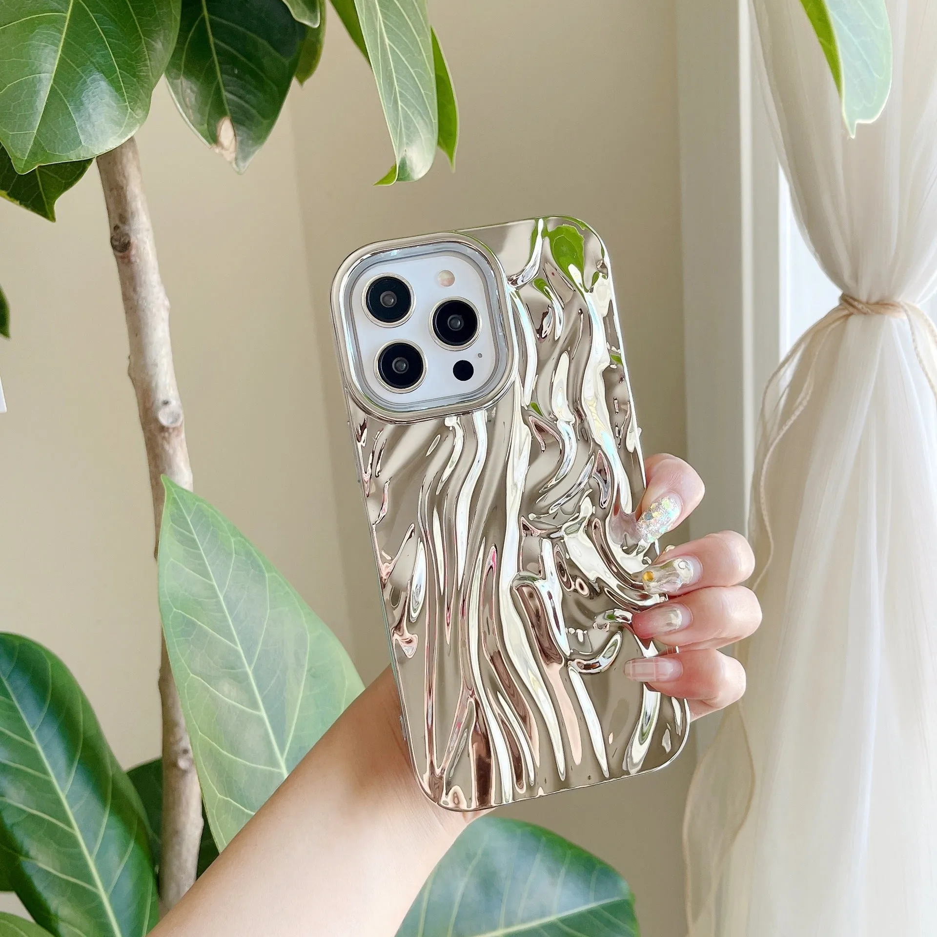 Soft TPU iPhone case with a textured pleated pattern in a rose red electroplated colour.