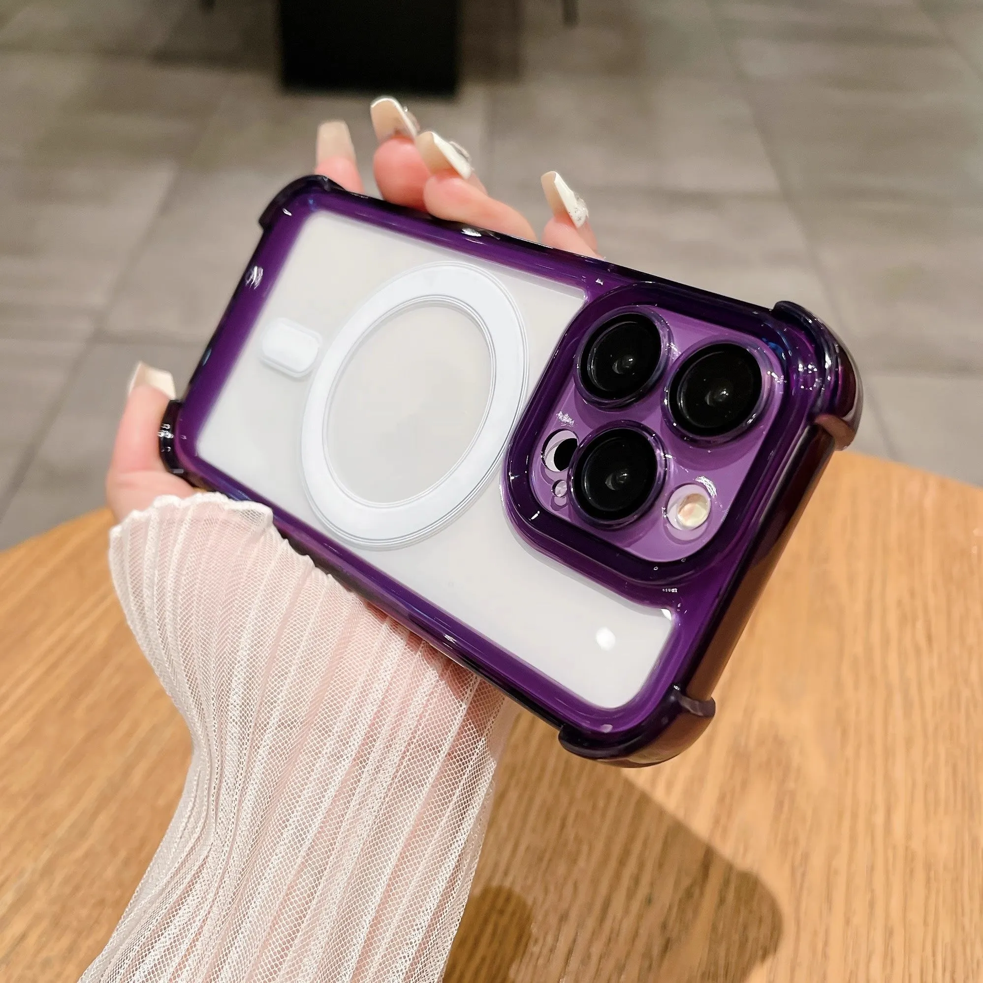 Transparent magnetic airbag silicone phone case with lens protector for iPhone models.