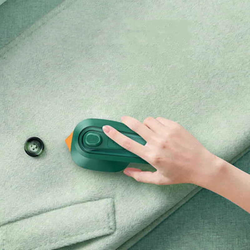 Dark green portable hanging steam ironing machine with ceramic panel.