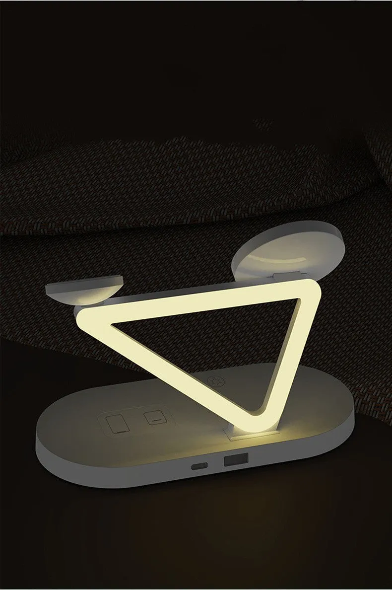 Black wireless charging station showing phone, Apple Watch and AirPods case charging simultaneously