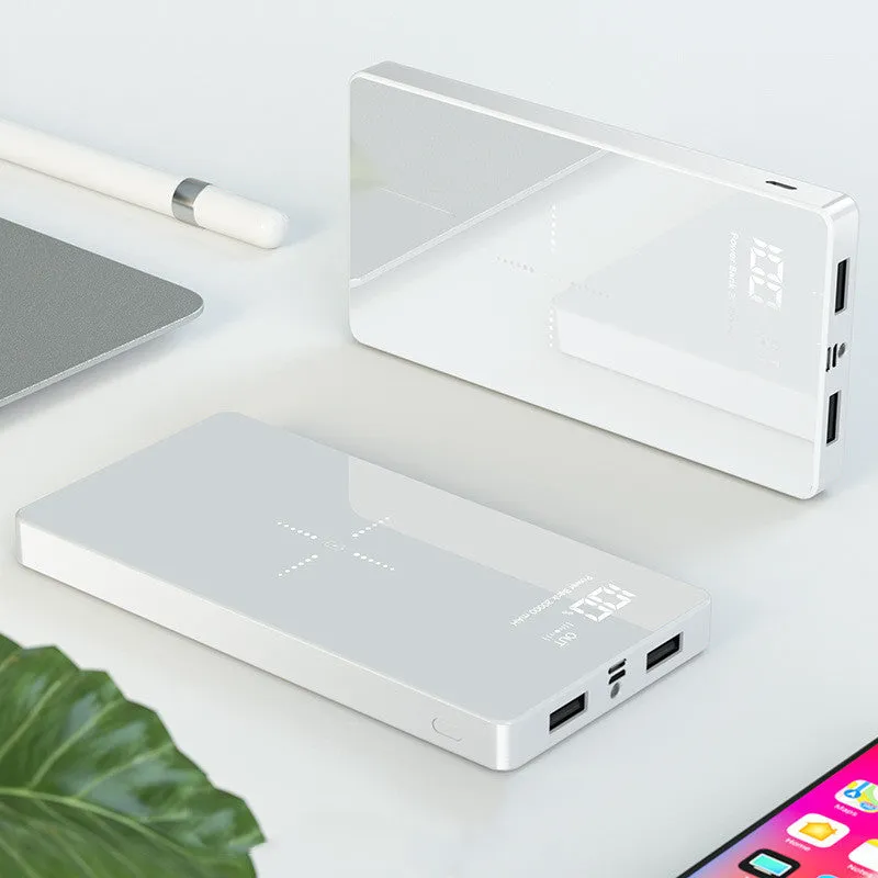Black wireless charging power bank with digital display showing battery percentage, measuring 73mm x 153mm x 22mm.