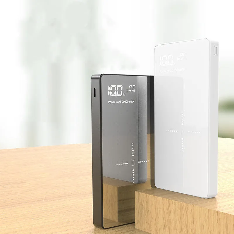 Black wireless charging power bank with digital display showing battery percentage, measuring 73mm x 153mm x 22mm.