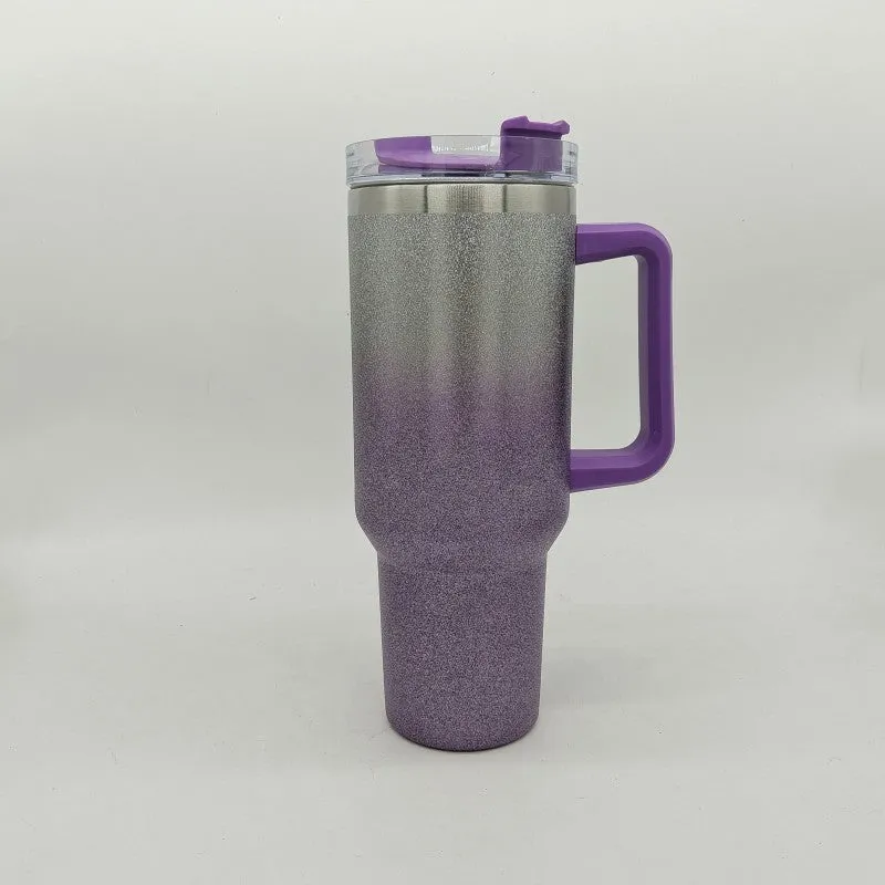 Large stainless steel vacuum insulation cup in a gradient colour finish, showing its size and simple design.