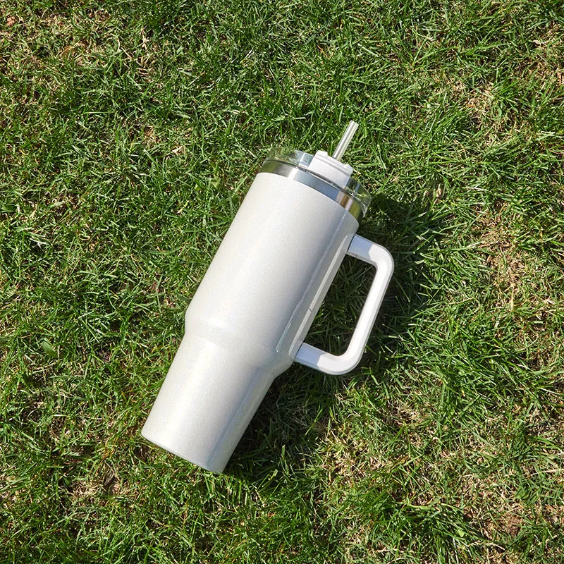 Large stainless steel vacuum insulation cup in a gradient colour finish, showing its size and simple design.