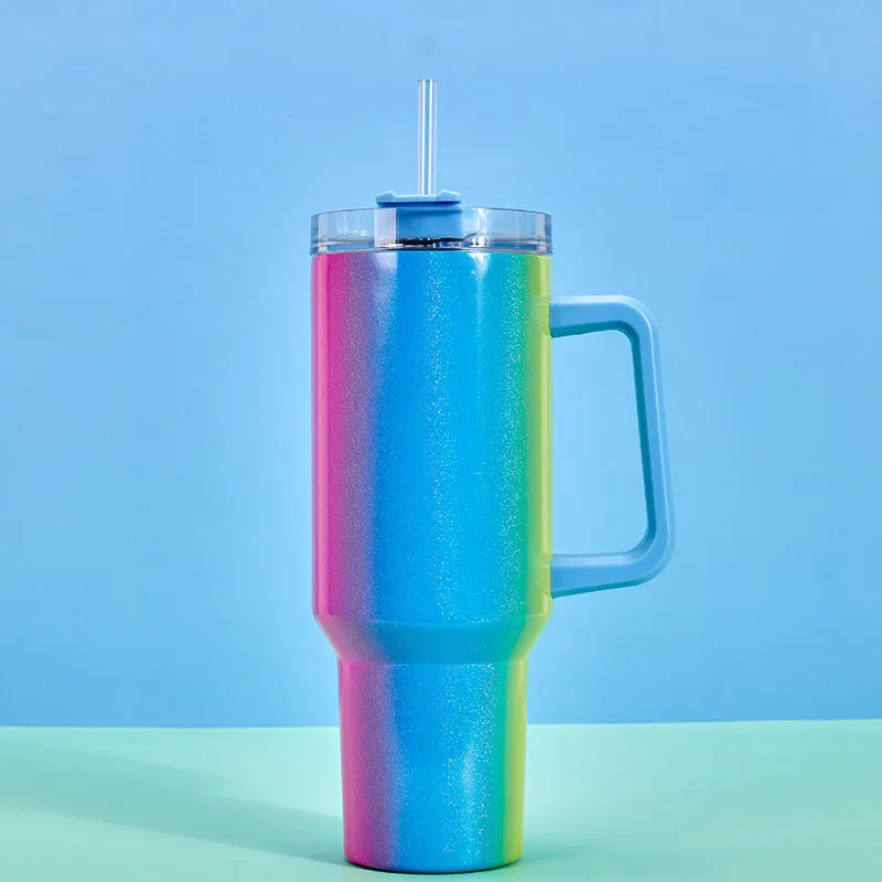 Large stainless steel vacuum insulation cup in a gradient colour finish, showing its size and simple design.