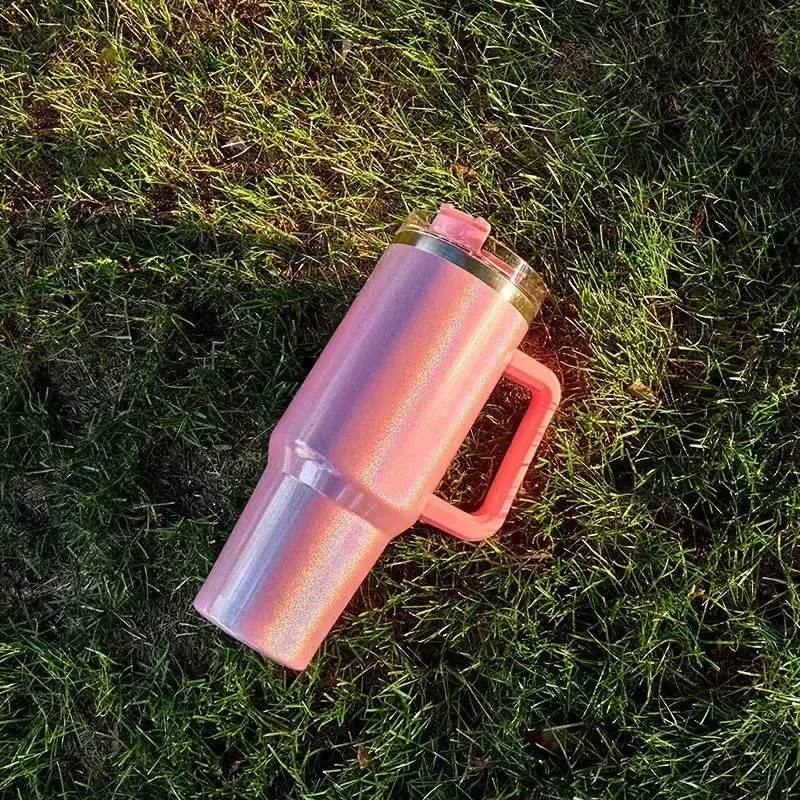Large stainless steel vacuum insulation cup in a gradient colour finish, showing its size and simple design.