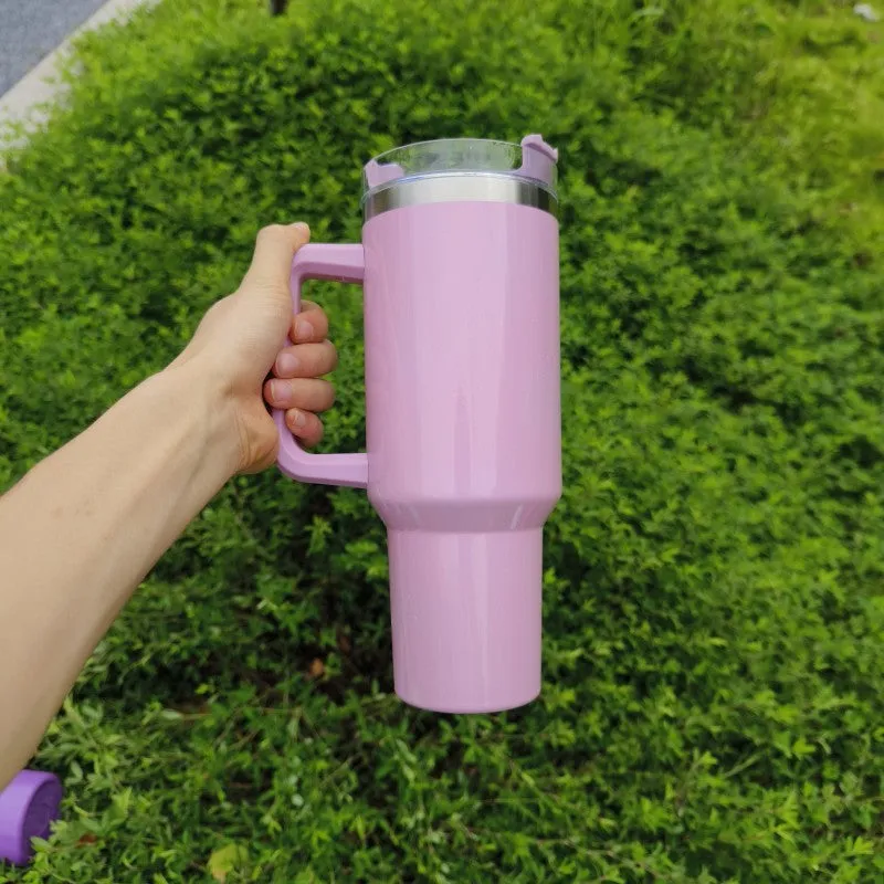 Large stainless steel vacuum insulation cup in a gradient colour finish, showing its size and simple design.