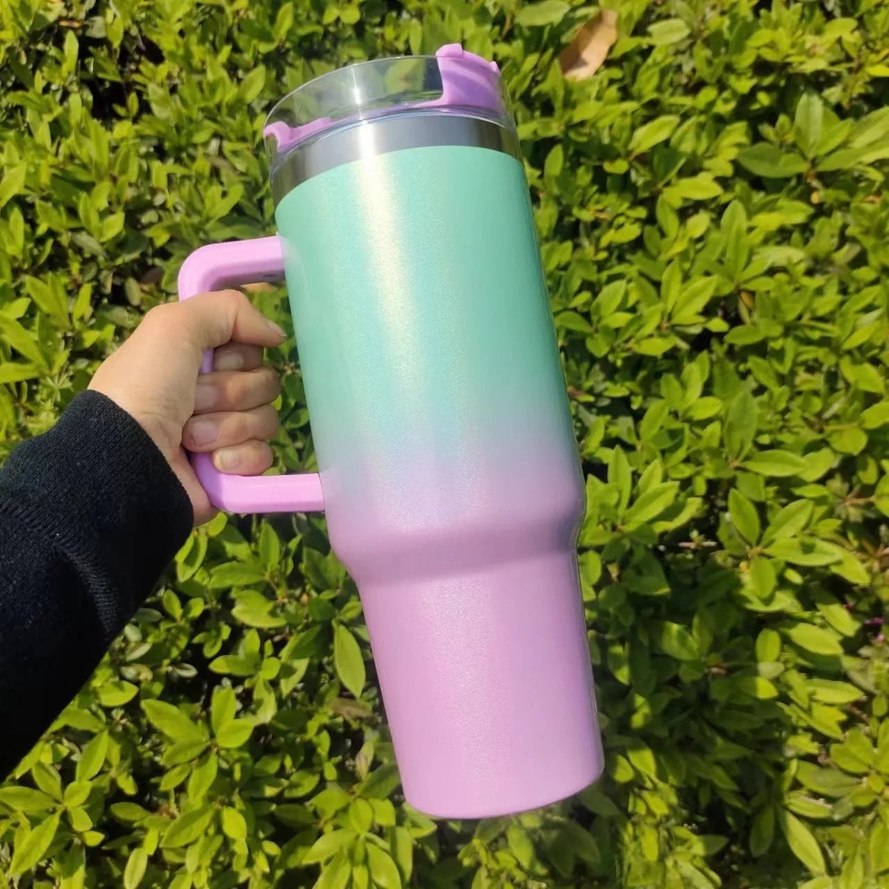 Large stainless steel vacuum insulation cup in a gradient colour finish, showing its size and simple design.