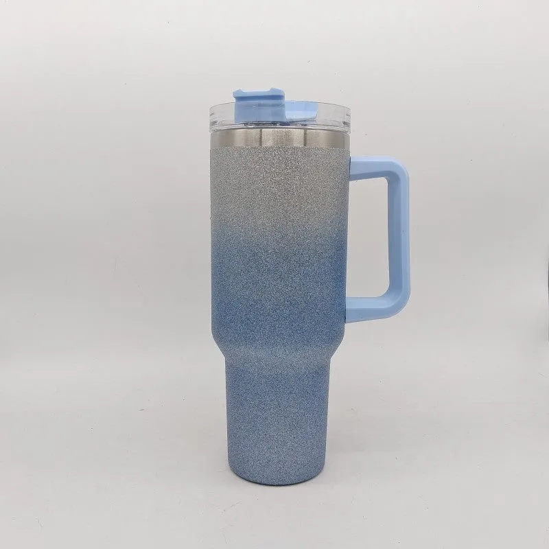Large stainless steel vacuum insulation cup in a gradient colour finish, showing its size and simple design.