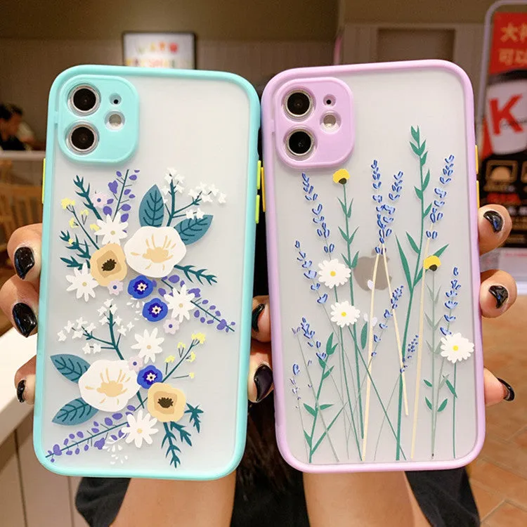 Matte pink lavender iPhone case with blue floral cartoon design and contrasting coloured frame.