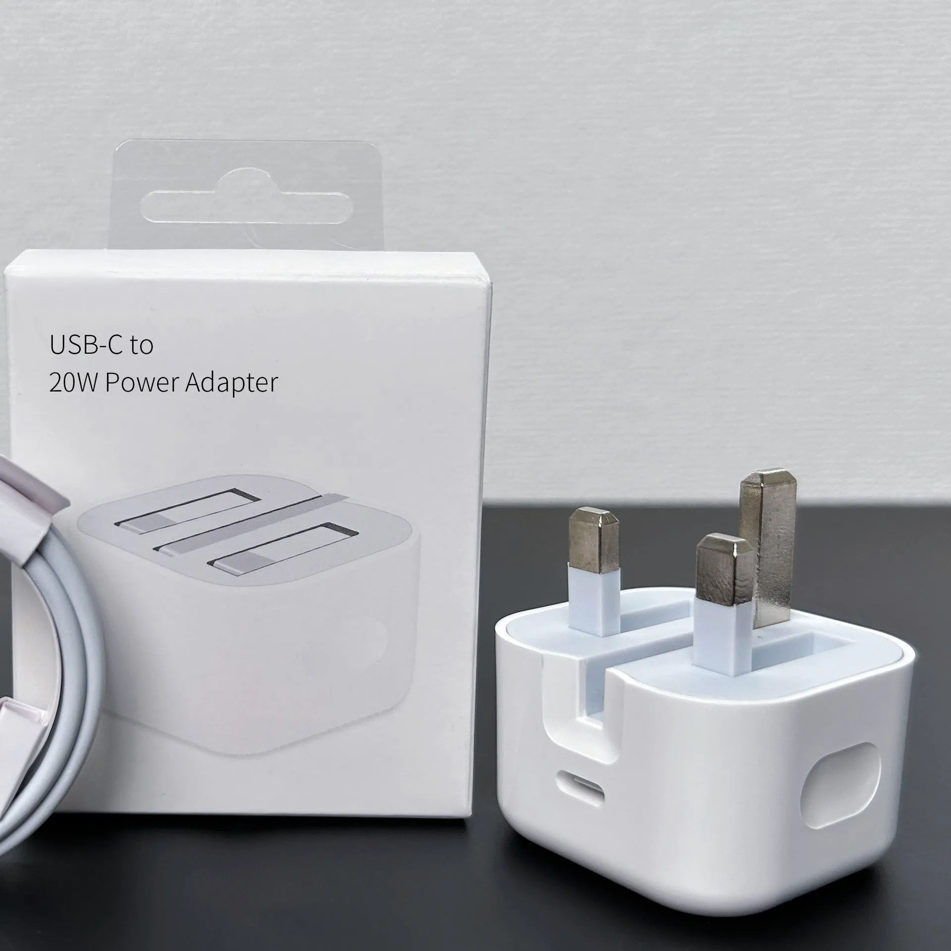 White 20W mobile PD charger with Type-C interface showing international plug compatibility