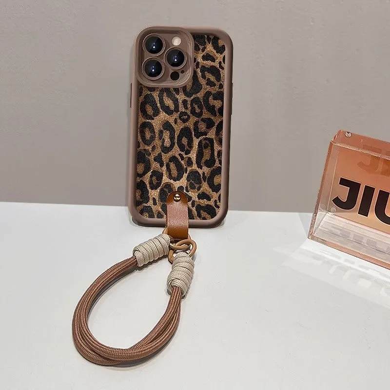 Brown leopard print silicone phone case with a detachable lanyard for an iPhone.