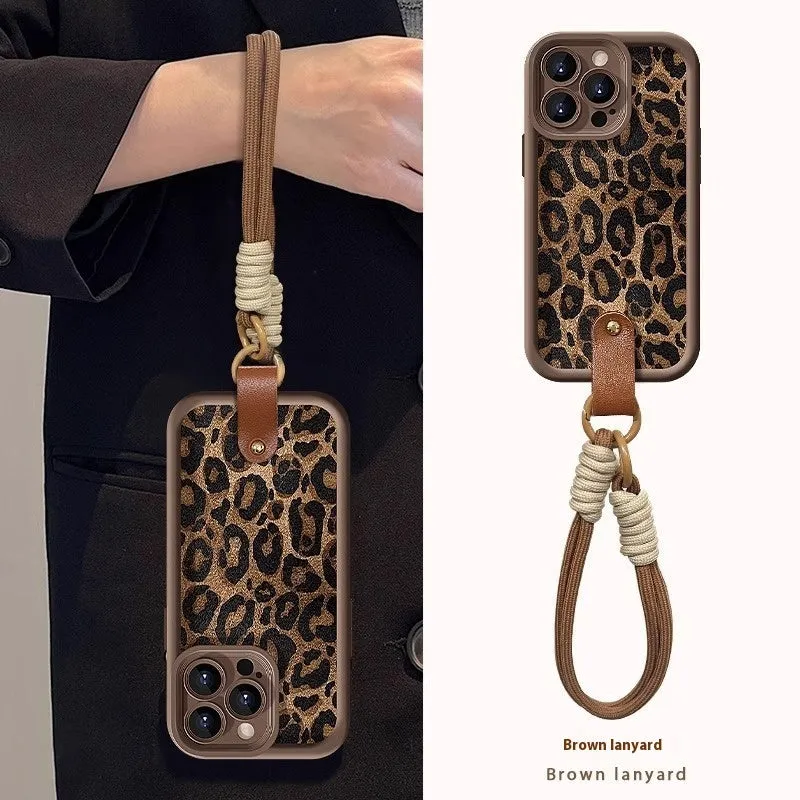 Brown leopard print silicone phone case with a detachable lanyard for an iPhone.