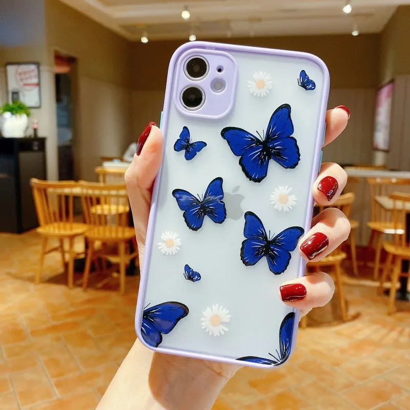 Butterfly design iPhone case with acrylic back and soft edge in pink, purple, and light blue colour options.