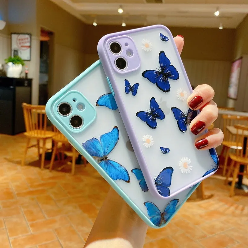 Butterfly design iPhone case with acrylic back and soft edge in pink, purple, and light blue colour options.