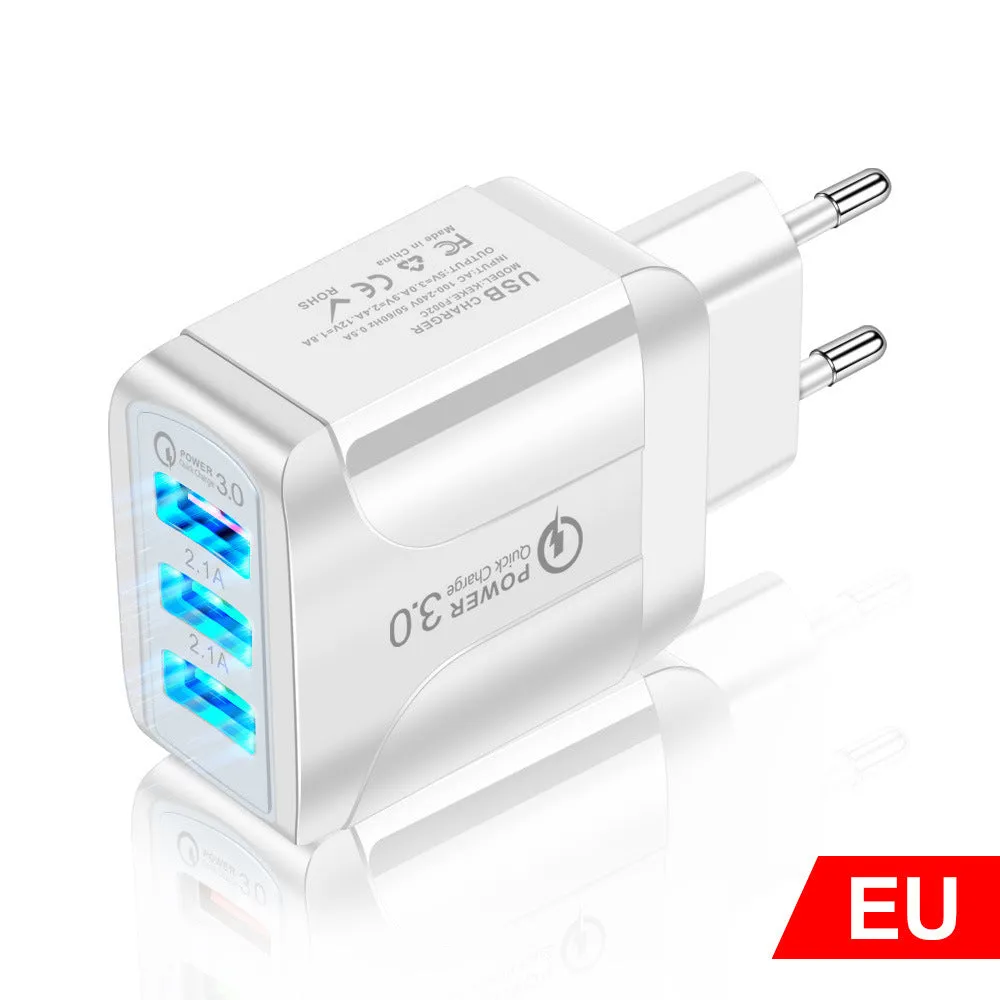 Black fast charge travel charger with 3 USB ports and a UK three-pin plug