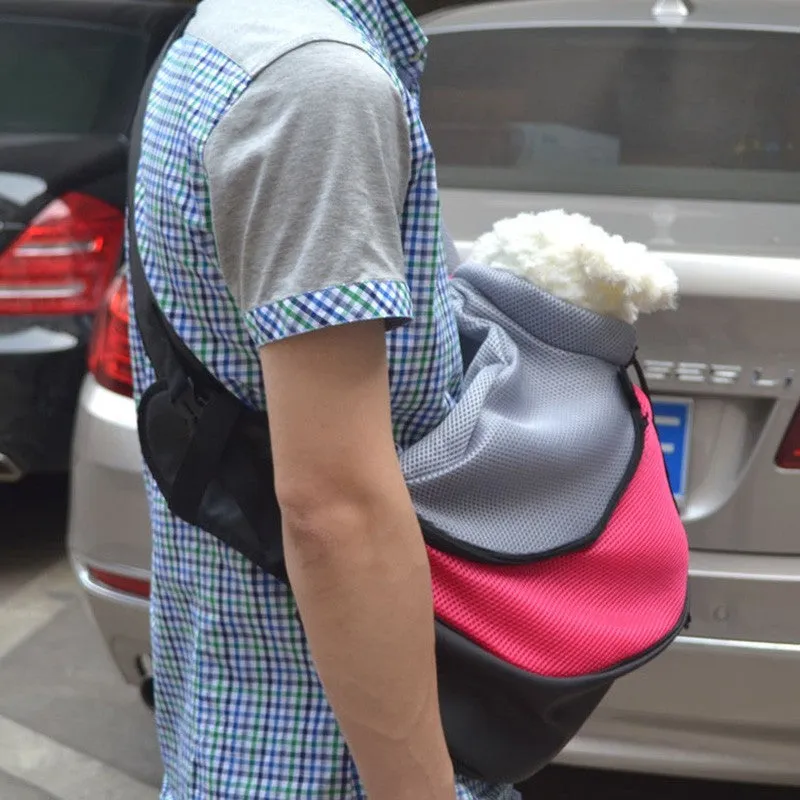 Blue pet backpack carrier for a small cat, showing padded interior and adjustable straps.