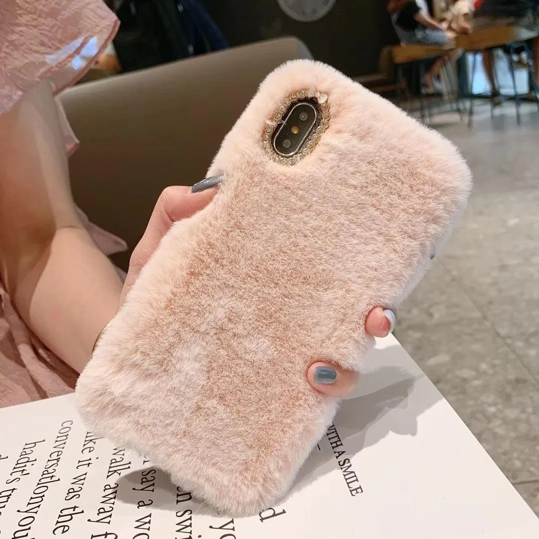 Rabbit hair silicone iPhone case with rhinestone detail and soft plush bottom shell in grey, brown, or pink colour
