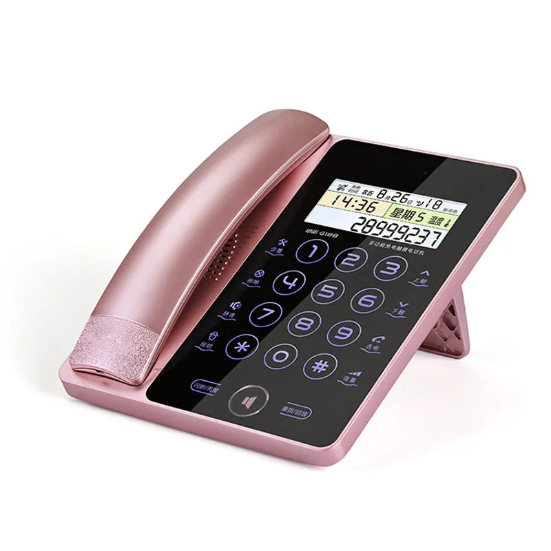 Creative Fashion G188 gold touch screen landline telephone on a desk