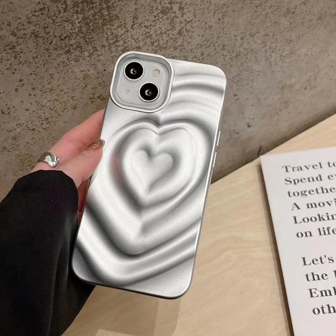 Solid colour TPU iPhone case with a raised 3D love design in bright purple.
