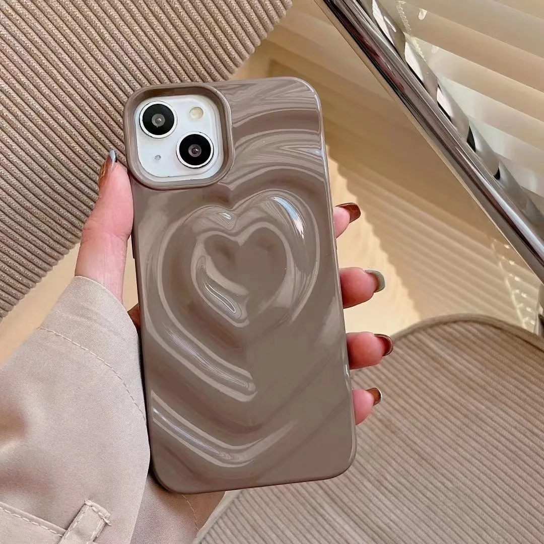 Solid colour TPU iPhone case with a raised 3D love design in bright purple.