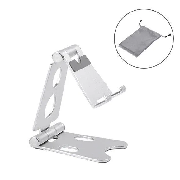 Foldable metal mini phone stand in gold black colour on a wooden desk