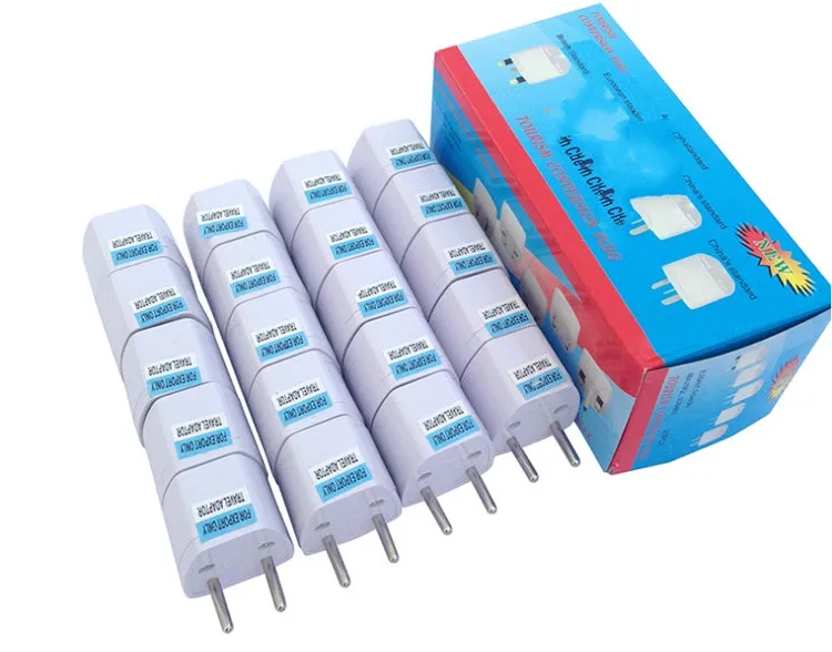A multi country travel conversion plug for British, American, Australian, and European power sockets.