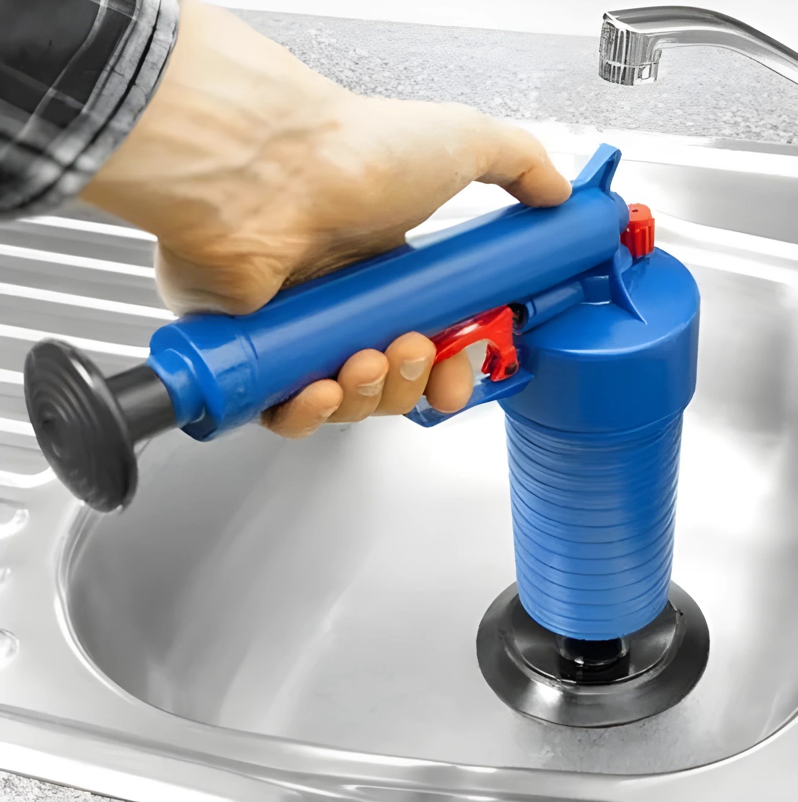 Plastic high-pressure drain blaster gun with four different sized rubber suction adaptors for unblocking pipes.