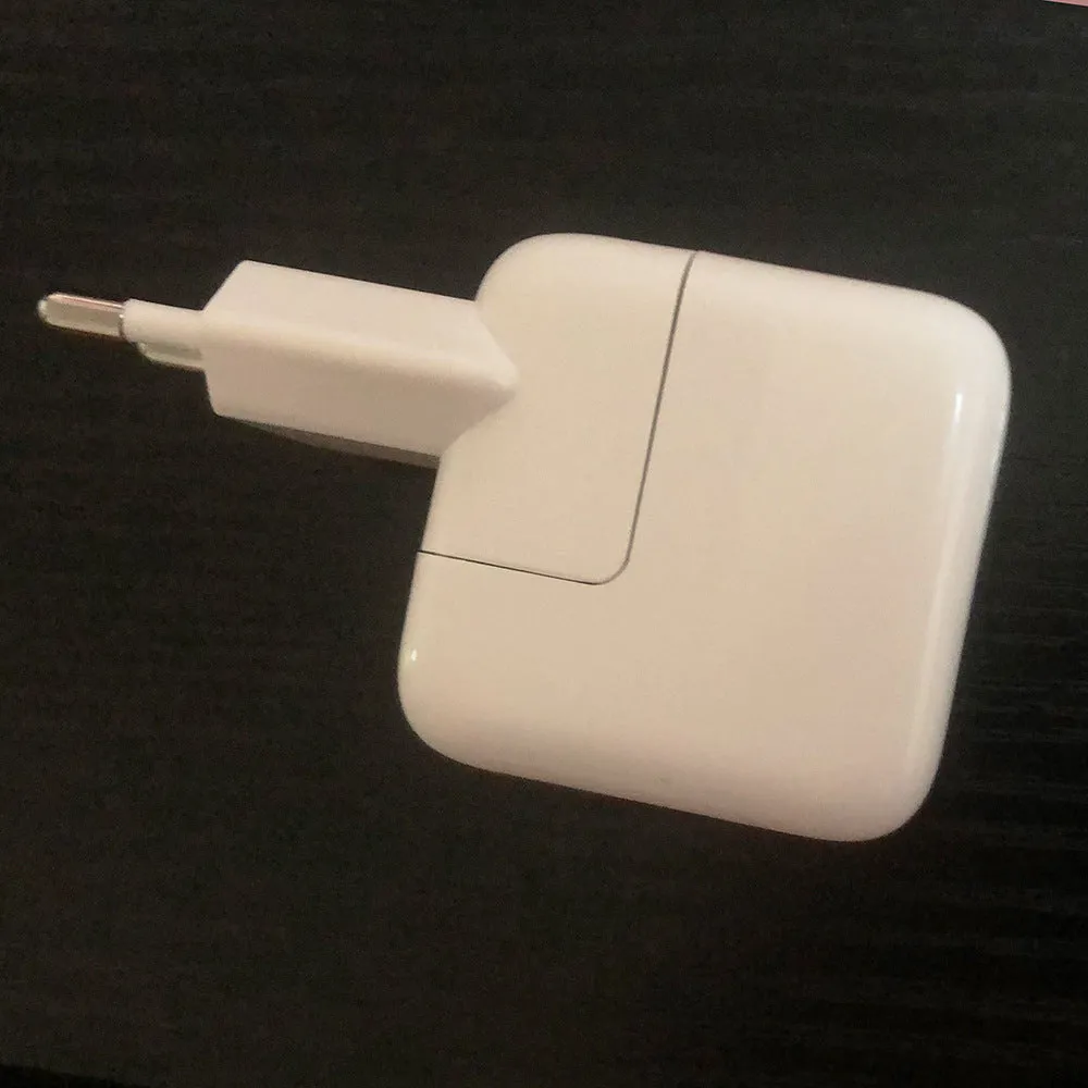 iPad wall charger with USB port available in US and European plug styles