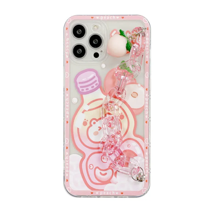 White silicone iPhone case with cartoon peach juice drink and bear design, shown with attached wrist strap.