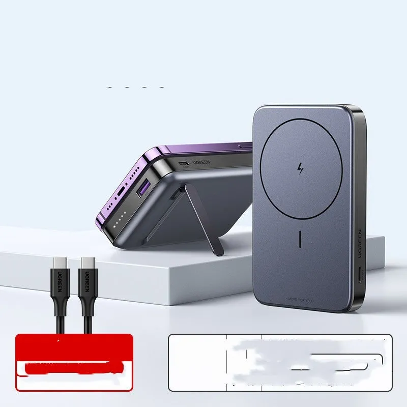 Small black portable magnetic bracket power bank with 10000mAh capacity on a table.
