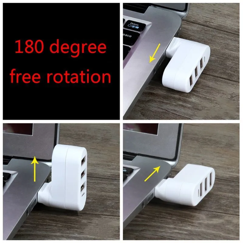 Black or white USB 2.0 four-port hub for laptop expansion on a desk.