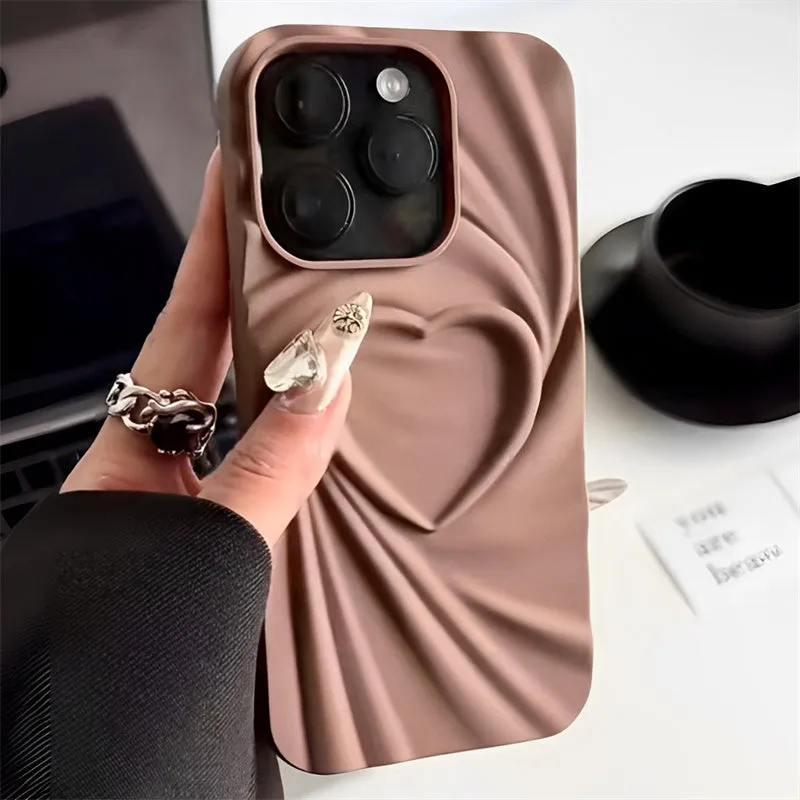 Silicone iPhone case with a simple ruffled heart design in mustard green colour.