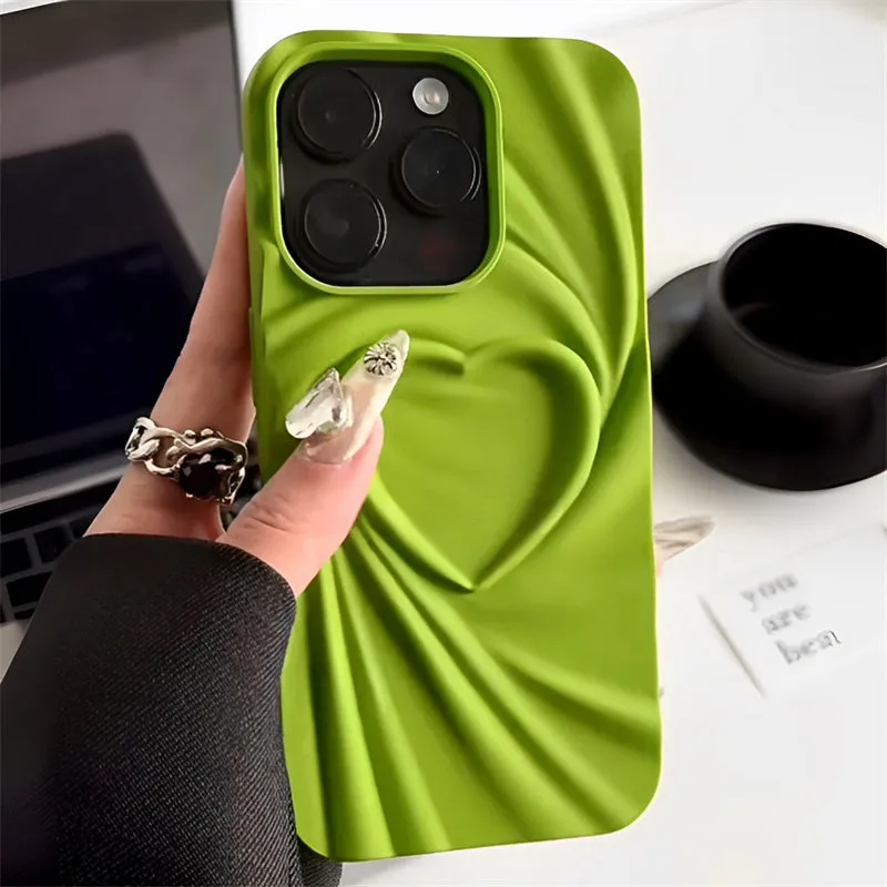 Silicone iPhone case with a simple ruffled heart design in mustard green colour.